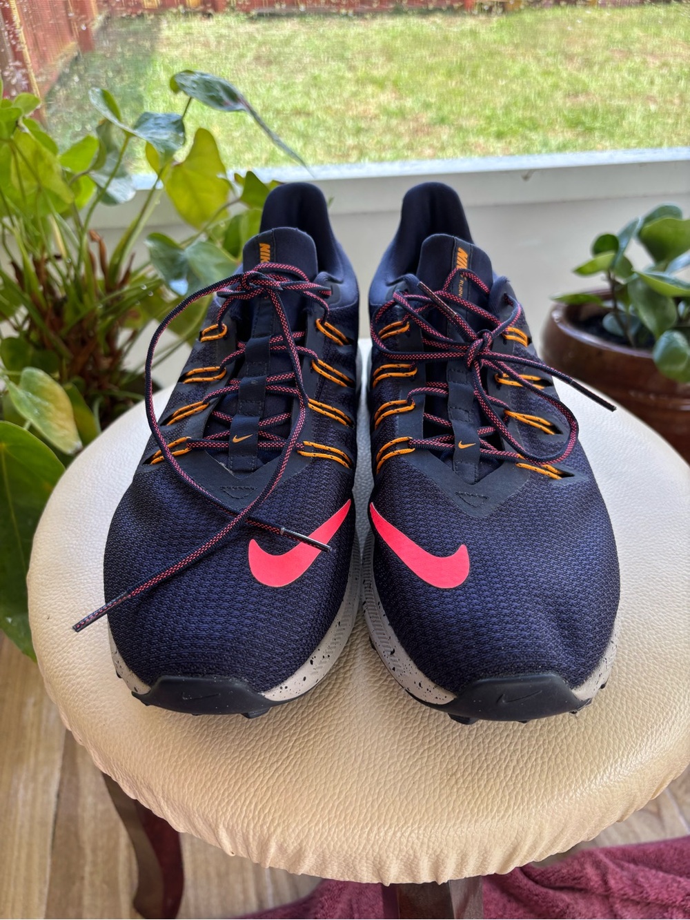 Nike navy blue Sneakers with Pink Swoosh and Orange Accents
